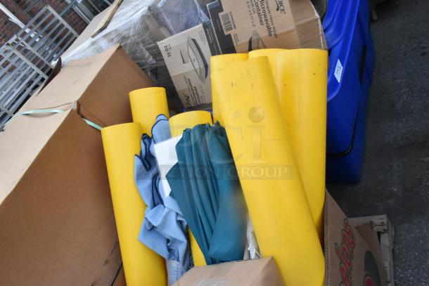 Various items including yellow tubes and boxes, featuring an Xlerator Hand Dryer. Condition appears used.