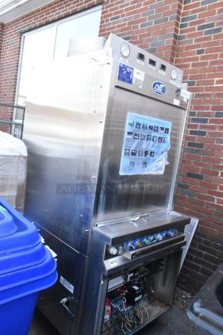 LVO FL14E stainless steel commercial pot and pan washer. Front load, 460V, 3-phase. Controls and labels visible.