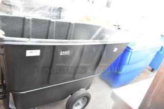 Two new Lavex tilt trucks, black and blue, with visible logo and wheels. Black: 74x34x45, Blue: 72x30x38.5 inches.