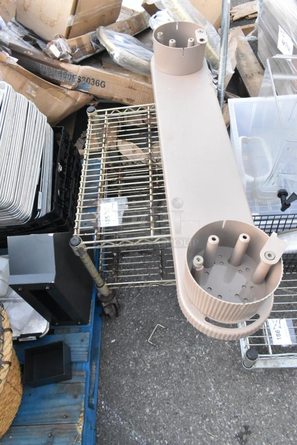 Chrome finish 2-tier shelving unit on casters. Requires dismantling by buyer. Consider freight charges.