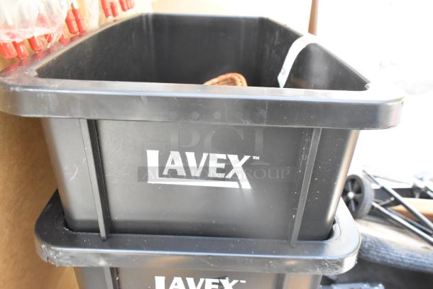 2 Lavex 23-gallon black slim trash cans, brand new with minor scratches. Rectangular, durable plastic, scratch and dent condition.