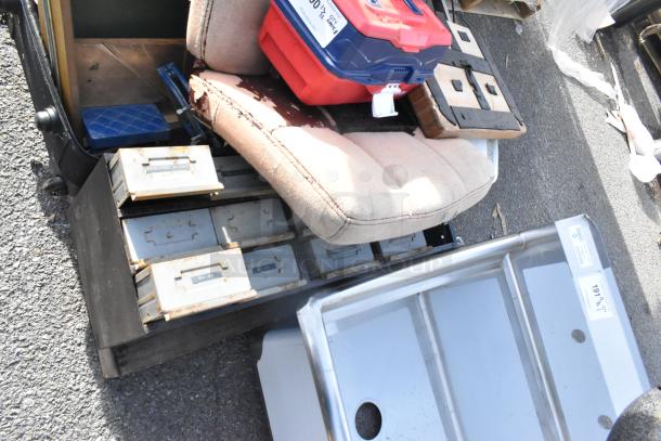 8 various items including worn seat cushions, and a rusted gray 12-drawer cubby. Includes a red and blue toolbox.