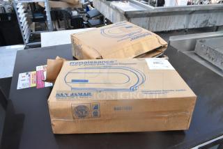 2 San Jamar R4000TBK Twin Jumbo Toilet Tissue Dispensers in box, new, scratch and dent condition, model R4017BSJ.