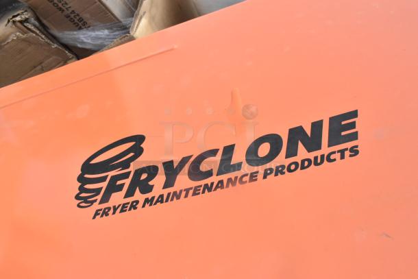 BRAND NEW 259OS100 Fryclone oil shuttle, 70-100 lb. capacity, slight dents on orange casing, labeled "Fryclone Fryer Maintenance Products".