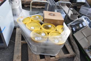 10 items including Uni-kem Panerrific Gold Pot and Pan Detergent, yellow lids, wrapped on a wooden pallet.
