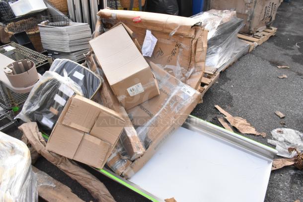 10 new scratch and dent items including boxed Steelton sink and Regency equipment stand; visible packaging wear.