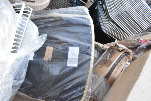 10 brand new scratch and dent items, including Steelton sink and Regency equipment stand, in packaging, visible labels.