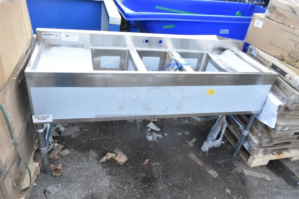 Brand new Regency 600B31014213 3-bowl underbar sink, 60"x18 3/4", with two drainboards, scratch and dent condition.