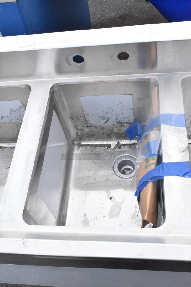 "Regency 600B31014213 3 bowl underbar sink, 60x18.75", new with scratches, includes two drainboards, stainless steel."