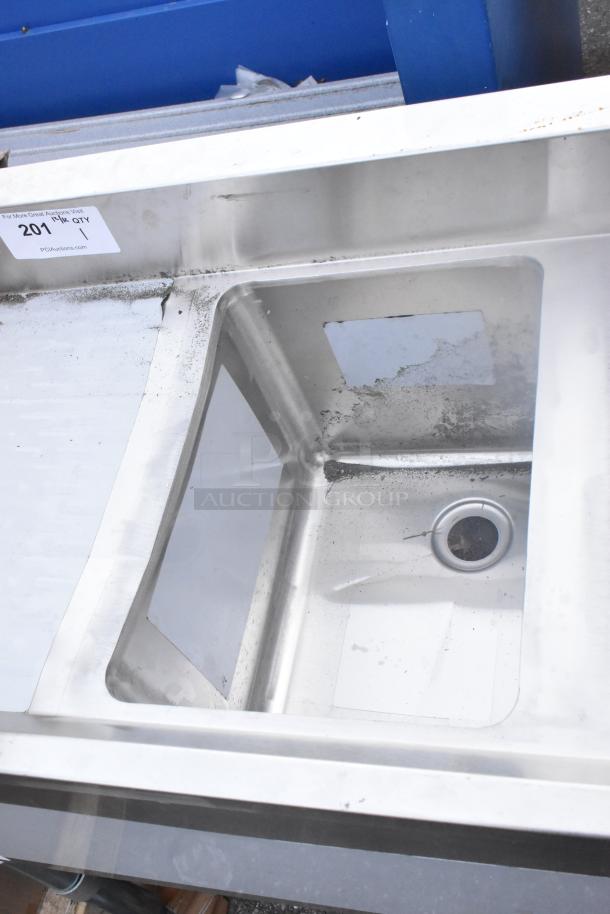 Brand new scratch and dent Regency 3-bowl underbar sink with two drainboards, 60"x18.75", tag indicates model 600B31014213.