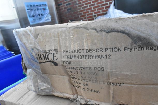 Cardboard box labeled "Choice" containing 6 pcs of 12" aluminum fry pans, item #407FRYPAN12, made in China. Box shows wear.