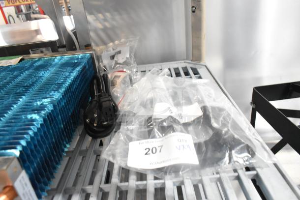 Brand new VacPak-It power cord, Avantco faucet, Avantco sight gauge, Hamilton Beach jar pad; scratch and dent condition.