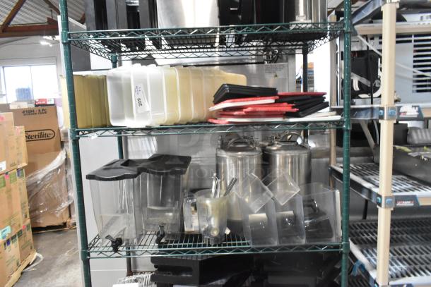 Two-tier metal shelf with poly bins, lids, stainless steel kegs, and hoppers. Includes labeled and assorted containers.