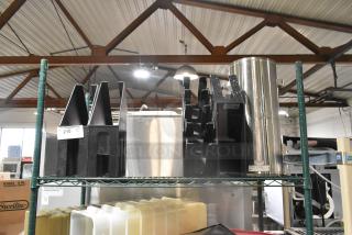 Tier lot including black lid dispensers and a stainless steel iced tea holder. Item tag labeled "210 - 1 lot" visible.