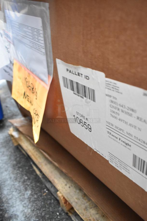 Cardboard box on pallet for Brand New Scratch and Dent 3 Compartment Recycle Bin, store label #10659 visible.