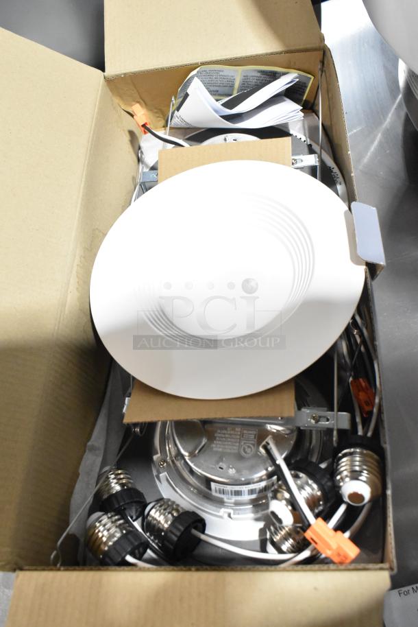 Brand new Halo LT56079FS1EWHR6PK white 6 in. LED recessed downlight in box, includes wiring and connectors.