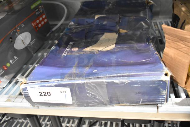 Boxed 750PRDL46 Waterloo pre-rinse faucet, 1.15 GPM, deck-mounted, 4" centers, 6" add-on, minor box wear, new condition.