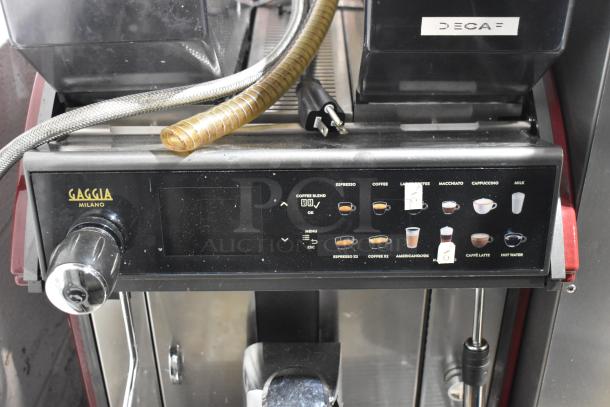 Brand new Gaggia 21ACONCETTO Super Automatic Espresso Machine, 208V, slight scratches, dual coffee bean hoppers, labeled controls.