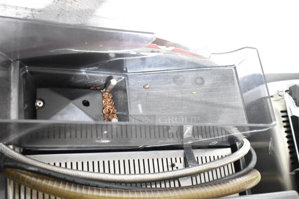 Brand new Gaggia 21ACONCETTO Concetto Evo Duo espresso machine, 208V, visible scratch and dent, bean container shown.