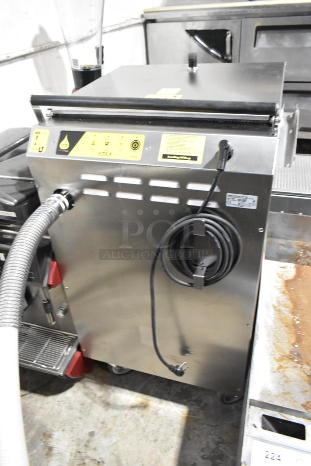 Brand new Vito VITO XM 137 lb. mobile fryer oil filter system with casters, 100-120V, 1 phase, minor scratches.