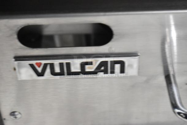 Brand new Vulcan VMG24-102 stainless steel commercial griddle, 54,000 BTU, scratch and dent condition. Vulcan logo visible.