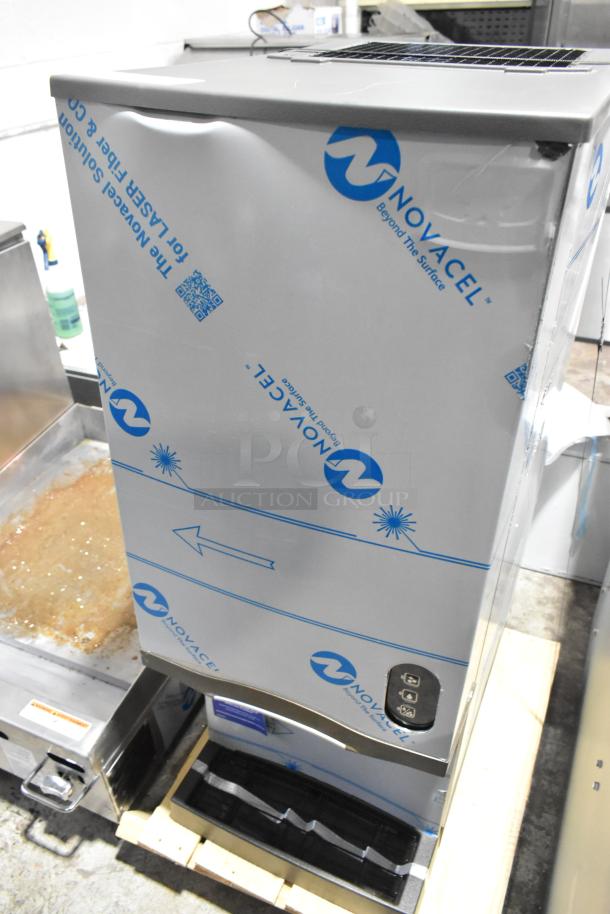 Manitowoc CNF0202A-161L stainless steel commercial ice maker, new, scratch and dent condition, 20 lb bin, lever dispensing.