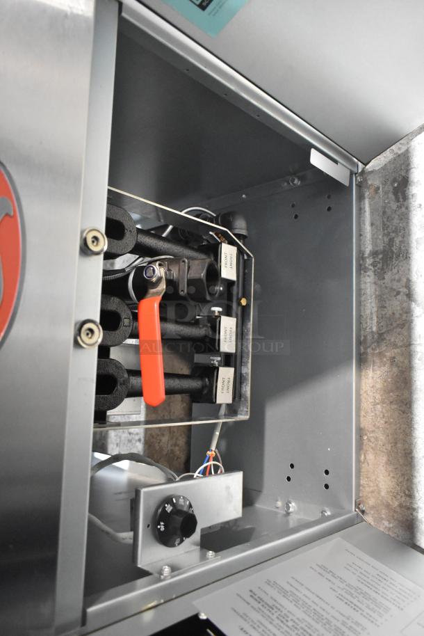 Brand new Avantco 177FBF1824LP stainless steel propane fryer, scratch and dent, 125 lb. capacity, 90,000 BTU, interior view.