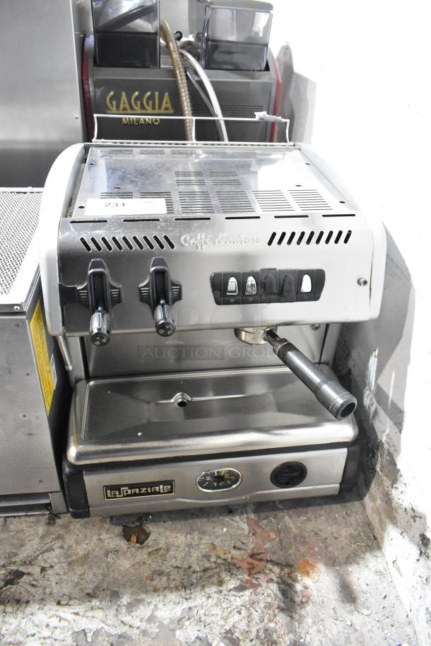 La Spaziale Caffe d'autore stainless steel espresso machine, brand new with some scratches. Includes portafilter.