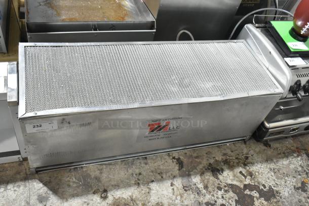 Brand new Curtron S-IBD-42-1 insect control air curtain, 42", 120V, 1 Phase. Metal casing, dent on side, factory label visible.