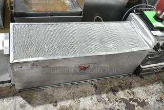 Brand new Curtron S-IBD-42-1 insect control air curtain, 42", 120V, 1 Phase. Metal casing, dent on side, factory label visible.