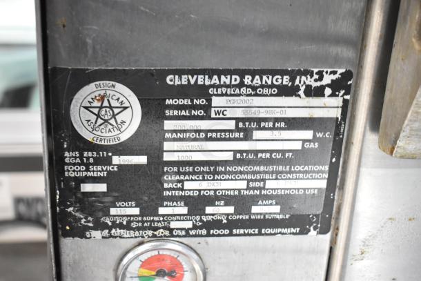 Cleveland PGM2002 stainless steel commercial pressure steamer, 200,000 BTU, model label shows specs and serial number WC 55549-98K-01.