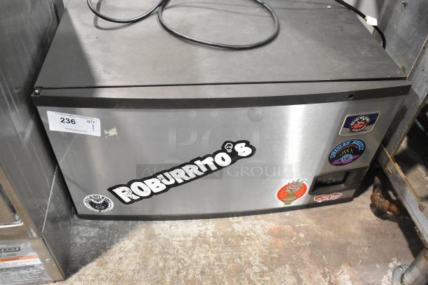 Manitowoc IY0304A-161 stainless steel commercial ice machine with stickers, 115 volts, 1 phase, used condition.