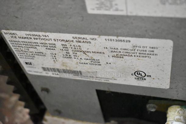 Manitowoc IY0304A-161 ice machine label showing model, serial number 1101305529, and electrical specifications.