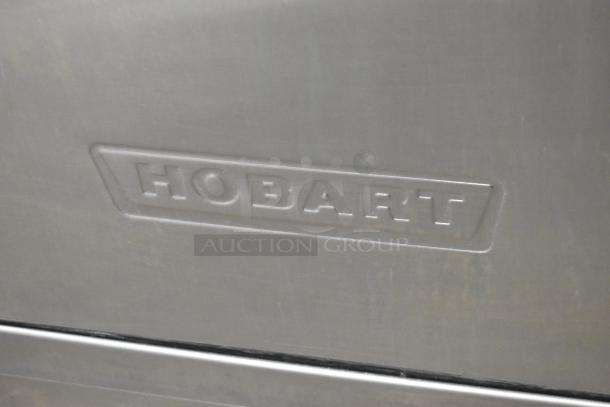 Hobart LXIH stainless steel commercial undercounter dishwasher. Visible Hobart logo; 120/208-240V, 1 phase.
