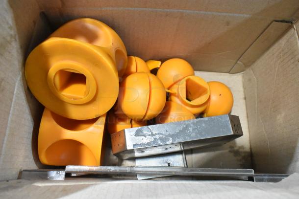 Box of orange plastic juicer parts and metal components for JuiceMatic MJ40 commercial citrus juicer; good condition.
