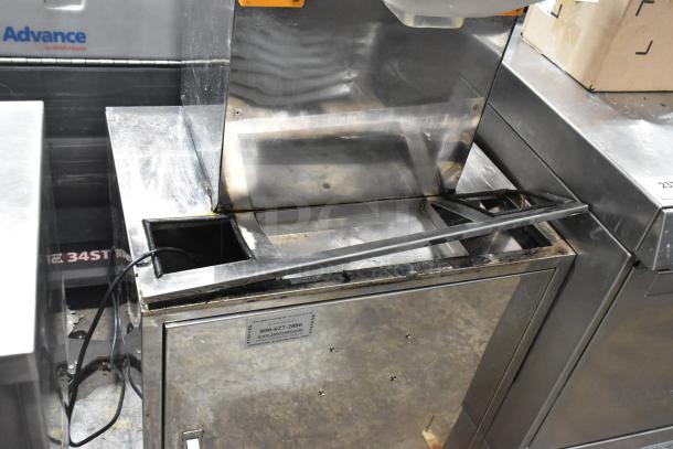 JuiceMatic MJ40 stainless steel commercial citrus juicer, floor style on casters. Features automatic feed, 115V, 1-phase.