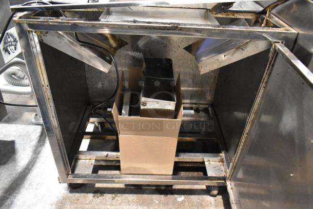 JuiceMatic MJ40 Citrus Juicer, stainless steel, commercial floor style, automatic feed, on casters, 115V, fair condition.