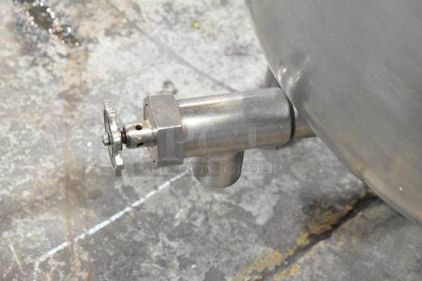 Cleveland KGL-60T stainless steel steam kettle spout, showcasing industrial-grade construction and valve details.