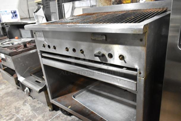 Rankin Delux RB-836 stainless steel charbroiler with under shelf, on commercial casters. Natural gas, well-maintained.
