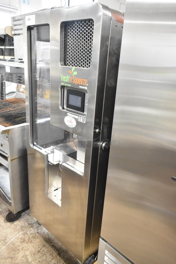 JBT Fresh N Squeeze Citrus Juicer, 2nd-Gen-MFJ-HE, stainless steel, commercial casters, Fresh N Squeeze branding, 120V.