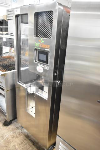 JBT Fresh N Squeeze Citrus Juicer, 2nd-Gen-MFJ-HE, stainless steel, commercial casters, Fresh N Squeeze branding, 120V.
