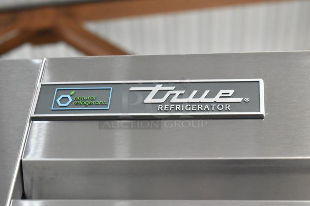 Alt text: "True T-35-HC stainless steel commercial cooler, natural refrigerant label, 2 door, new scratch and dent condition."