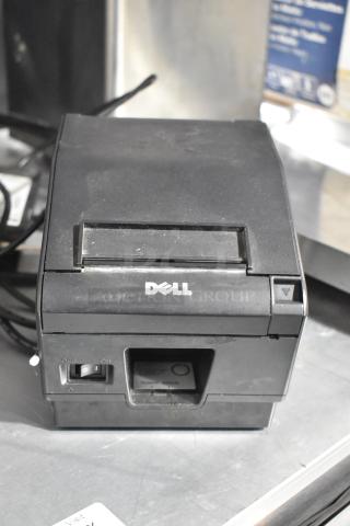 Dell T200 Receipt Printer, black, with power switch and Dell logo. Model T200. Shows minor wear, ideal for retail use.