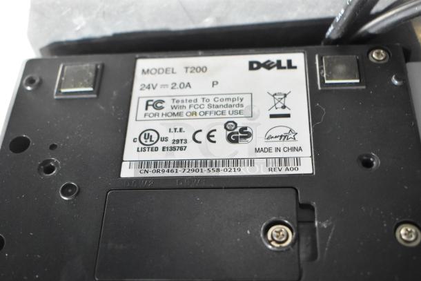 Dell T200 Receipt Printer label showing model, power specs, compliance marks, and serial number.