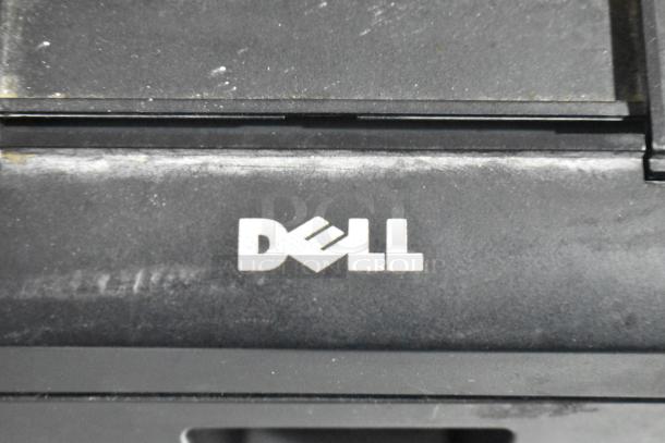 Dell T200 Receipt Printer, black, showing Dell logo on the front. Some wear visible, functional condition.