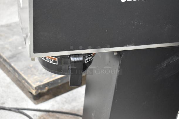 Bunn VPR-APS coffee machine, stainless steel, countertop model, brand new with minor dents, 120V, warning labels visible.