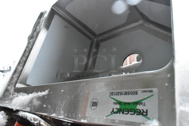 Regency corner mop sink, model 600SM162012C, new condition, with snow. Stainless steel construction, NSF certified label.
