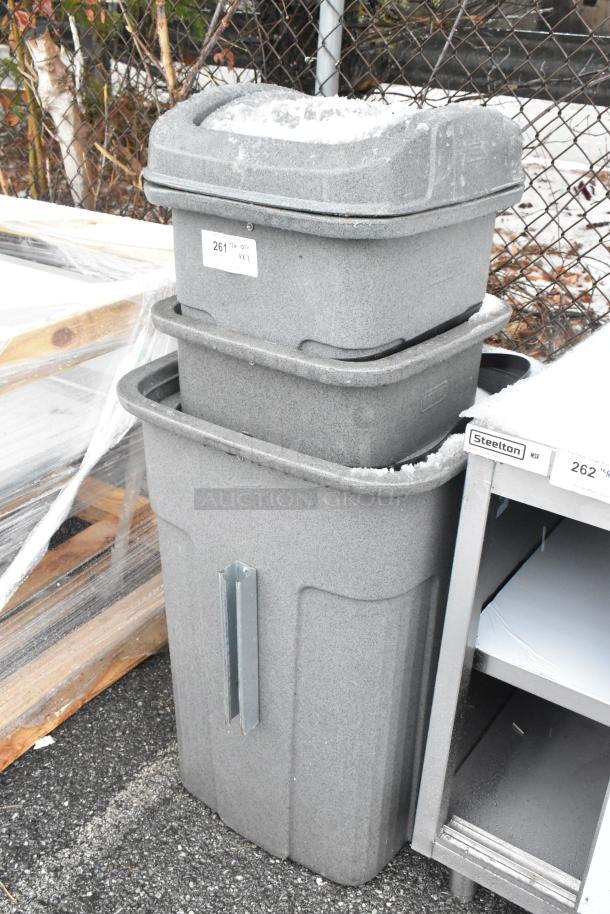 Three new gray poly trash cans, stackable, with some scratches and dents. Visible label: "261 max qty VX2."