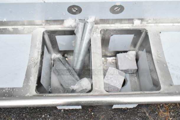 Regency 600S21014216 stainless steel 2-bay sink with dual drain boards, brand new with slight dents.