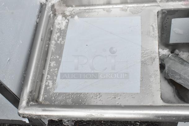 Regency 600S21014216 stainless steel 2-bay sink with dual drain boards, scratch and dent condition, brand new.